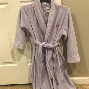 Purple robe with pink crow on the top left corner.